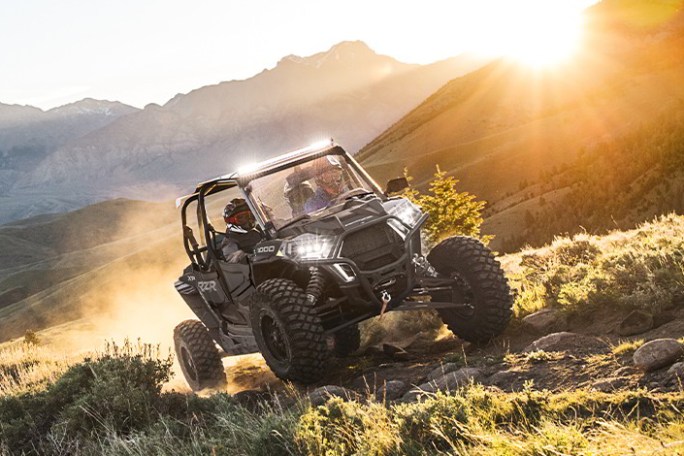 a car parked on the side of a mountain