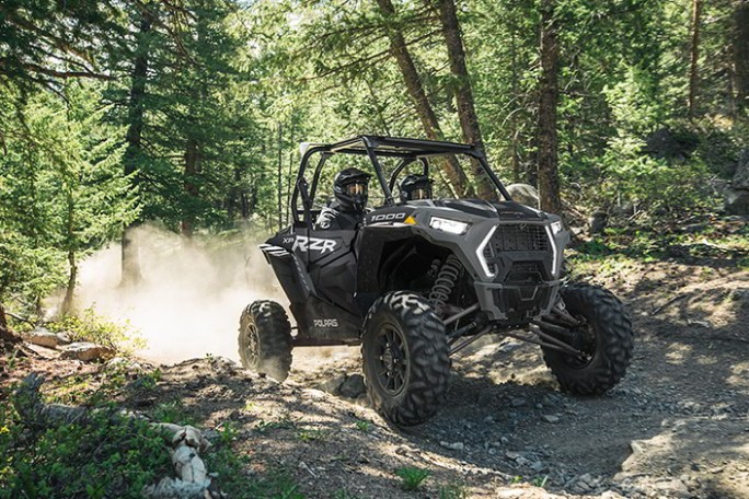 a tractor parked in the dirt